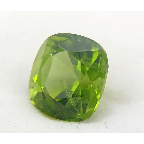 592 - A 5.73ct Pakistan Origin Peridot Gemstone - Perfect Eye Clean Cushion Cut Piece. GGI certified. ZK28... 