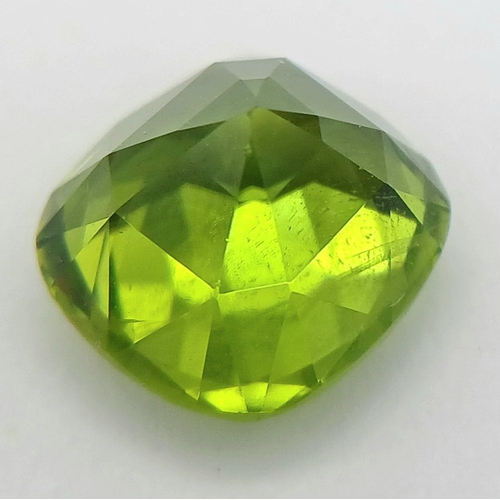 592 - A 5.73ct Pakistan Origin Peridot Gemstone - Perfect Eye Clean Cushion Cut Piece. GGI certified. ZK28... 