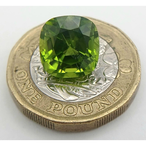 592 - A 5.73ct Pakistan Origin Peridot Gemstone - Perfect Eye Clean Cushion Cut Piece. GGI certified. ZK28... 