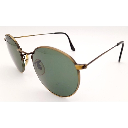 663 - A Pair of Vintage Ray Ban Sunglasses in Their Original Case. Very collectible.