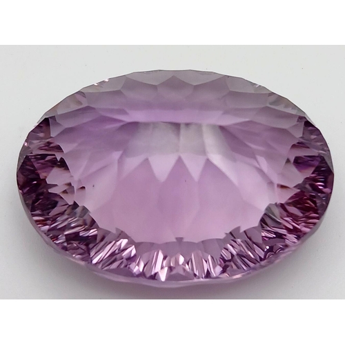 779 - An 80.02ct Amethyst Oval Cut Gemstone. AIG Certified. ZK314