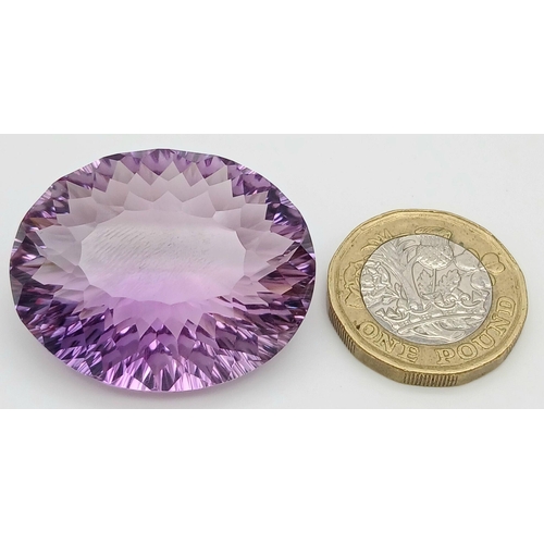 779 - An 80.02ct Amethyst Oval Cut Gemstone. AIG Certified. ZK314