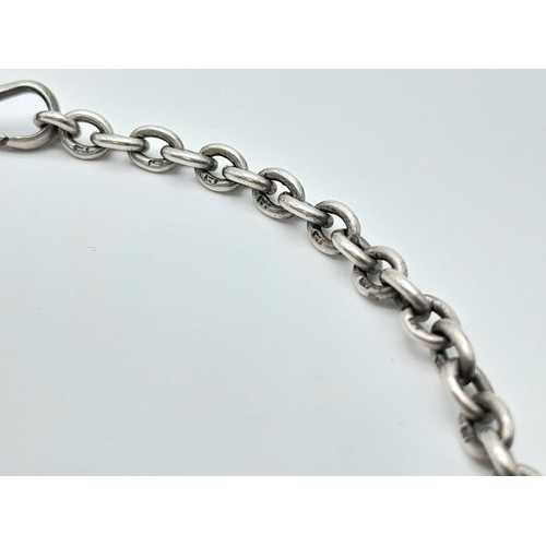 832 - A silver double Albert watch chain with fob and T-bar. 40.5cm in length and 28.6g total weight.