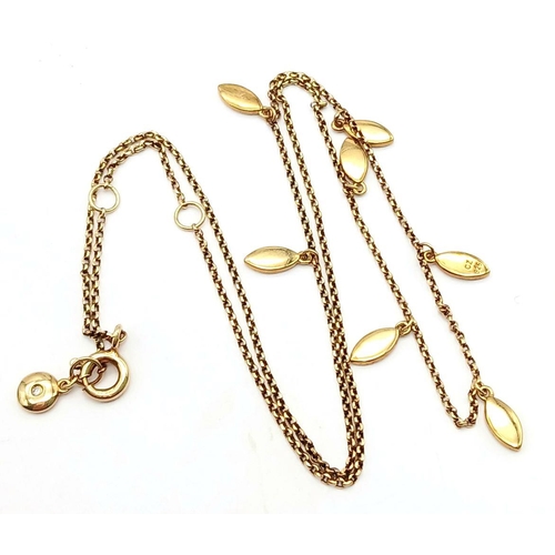 884 - A gilt silver necklace with delicate drop accents. approx 42.4cm in length , 3.4g total weight.