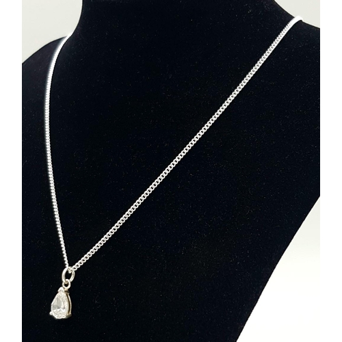 891 - A sterling silver necklace featuring a clear stone teardrop pendant. 50.1cm in length , 1.8cm x 0.6c... 