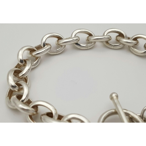 1145 - An attractive Solid Silver 925 Chunky Bracelet, T Bar Heart Tag and Pearls, 29.6 grams, 20 cm. In ex... 