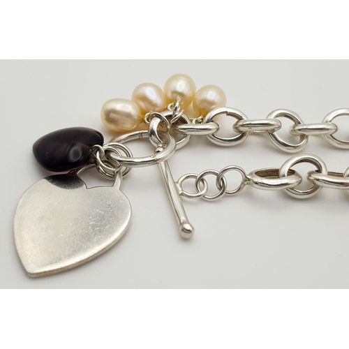 1145 - An attractive Solid Silver 925 Chunky Bracelet, T Bar Heart Tag and Pearls, 29.6 grams, 20 cm. In ex... 