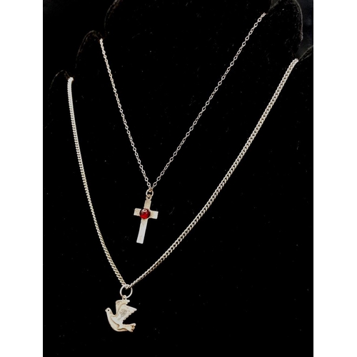 1166 - A silver chain with a garnet-set crucifix pendant (41.4cm chain, 2.6cm x 1.5cm pendant) and a silver... 