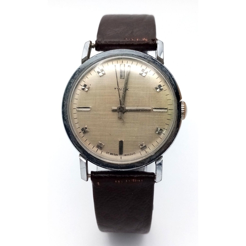 1453 - Gentleman vintage TIMEX WRISTWATCH. Finished in stainless steel. Recently fitted Quality leather str... 