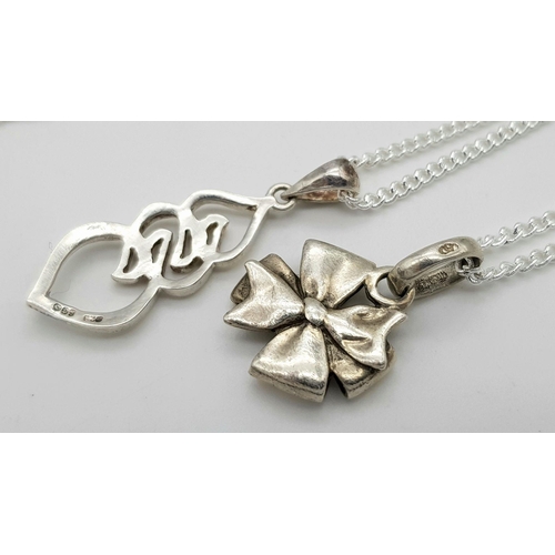 1590 - Two 925 Silver Necklaces with Pendants - bow and abstract design. 2.3cm bow pendant, 3.1cm abstract ... 