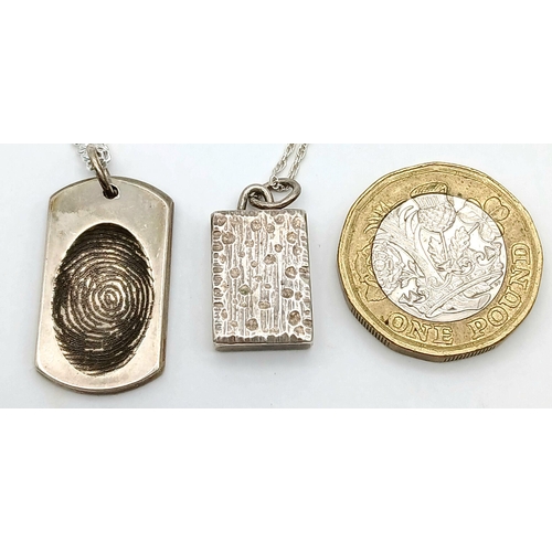 912 - Two 925 Silver Pendant on Chains - fingerprint and abstract design. 2.3cm and 2.9cm pendants, 40cm a... 