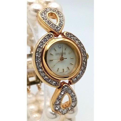 168 - A very collectible, JOAN RIVERS glamorous watch with cubic zirconia and a double shell pearl bracele... 