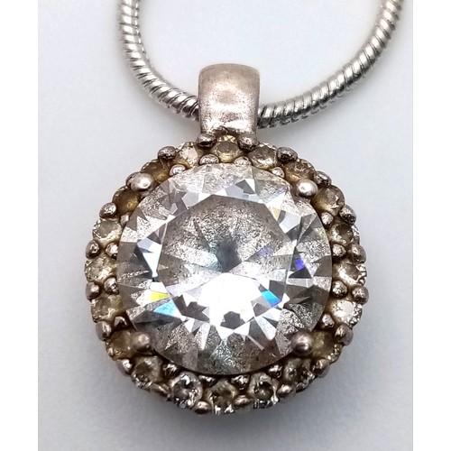 1576 - A Cubic Zirconia Pendant Set on 925 Silver with a Silver Snake Chain Necklace. 1.5cm pendant, 41cm c... 