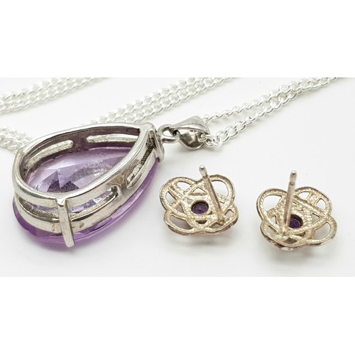 1467 - A 925 sterling silver necklace with an amethyst drop pendant, accompanied by matching amethyst earri... 