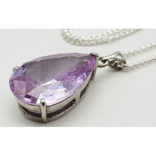 1467 - A 925 sterling silver necklace with an amethyst drop pendant, accompanied by matching amethyst earri... 