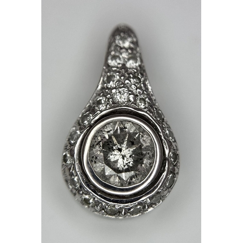 1136 - A FABULOUS WHITE GOLD PENDANT WITH A 1.7ct  OLD CUT DIAMOND CENTRE STONE AND A FURTHER .4ct OF ENCRU... 