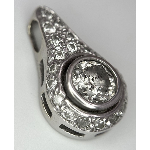 1136 - A FABULOUS WHITE GOLD PENDANT WITH A 1.7ct  OLD CUT DIAMOND CENTRE STONE AND A FURTHER .4ct OF ENCRU... 