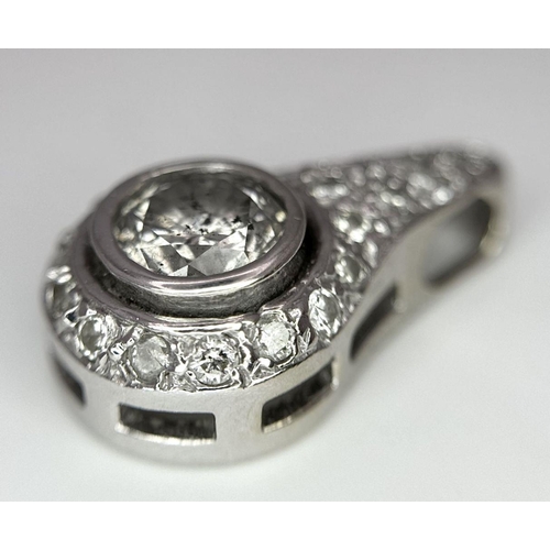 1136 - A FABULOUS WHITE GOLD PENDANT WITH A 1.7ct  OLD CUT DIAMOND CENTRE STONE AND A FURTHER .4ct OF ENCRU... 