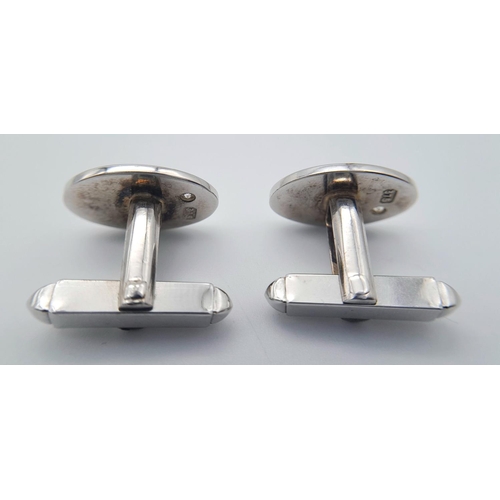 1383 - A Pair of 9K White Gold Diamond Set Cufflinks. 11.5g total weight.