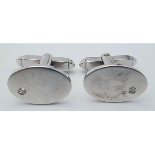 1383 - A Pair of 9K White Gold Diamond Set Cufflinks. 11.5g total weight.