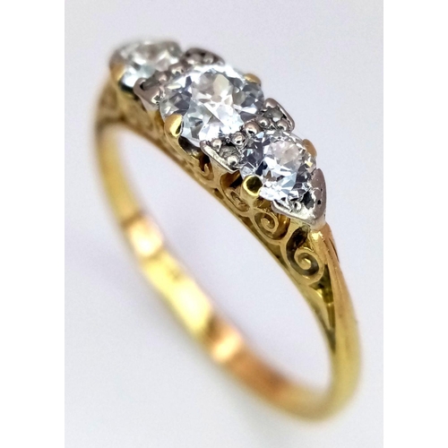 101 - A Beautiful 18K Yellow Gold Three Stone Diamond Ring. 0.55ctw of brilliant round cut diamonds in a s... 