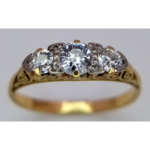 101 - A Beautiful 18K Yellow Gold Three Stone Diamond Ring. 0.55ctw of brilliant round cut diamonds in a s... 