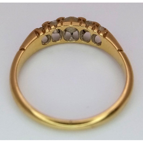 108 - An Antique 18K Yellow Gold Five Stone Diamond Ring. 0.5ctw of old cut European diamonds in a claw se... 