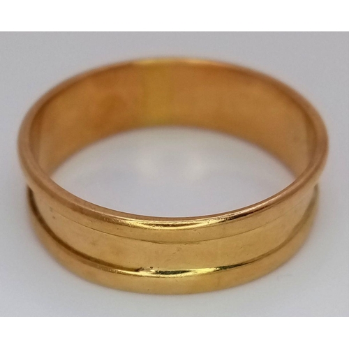 353 - An 18K Yellow Gold Band Ring. Size U. 6mm width. 4.25g weight.