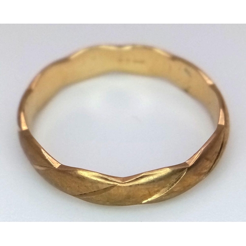 367 - A 9K Yellow Gold Undulating Band Ring. 4mm width. Size M. 2g.