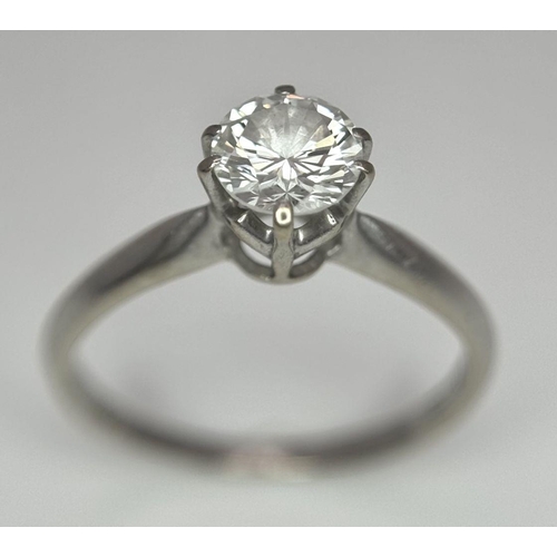 632 - A STUNNING DIAMOND SOLITAIRE RING WITH A TOP QUALITY 0.80ct DIAMOND SET IN 18K GOLD. 2.5gms    size ... 