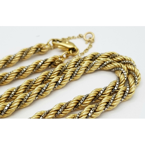 100 - A 9K Yellow Gold Rope Necklace with a 9K White Gold Entwined Venetian Link Chain. 56cm. 21.2g weight... 