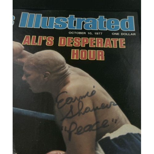 121 - A Signed Muhammad Ali and Ernie Shavers 1977 Sports Illustrated Framed Magazine. Titled: Ali's Despe... 