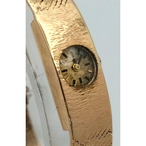 143 - A Vintage Bueche Girod 9K Gold Ladies Watch. 9k gold bracelet and case - 11g. Patinaed gilded dial. ... 