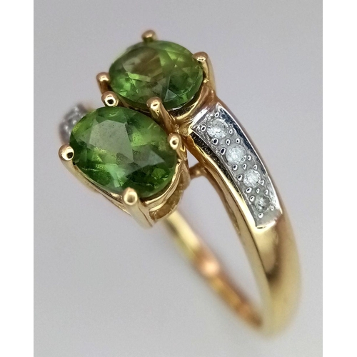 149 - A 14K Yellow Gold Diamond and Peridot Crossover Ring. Size P 1/2. 3.6g total weight.