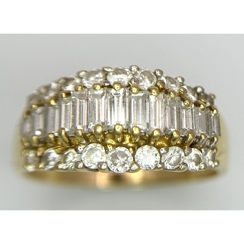 16 - An 18K Yellow Gold Three Row Diamond Ring. An extravagant central row of baguette cut diamonds with ... 