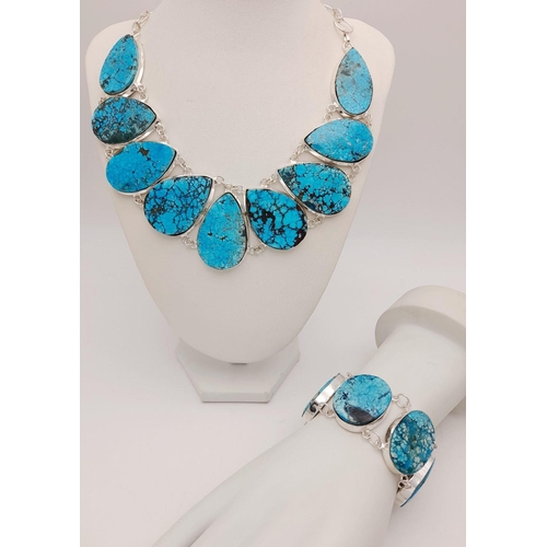 185 - A statement, sterling silver, natural turquoise necklace and bracelet set. Necklace length: 50 cm (m... 