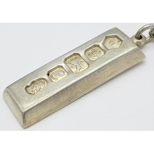 241 - A 925 sterling silver 1977 Sheffield ingot pendant, 15x40mm, with a 925 silver necklace, length 29cm... 