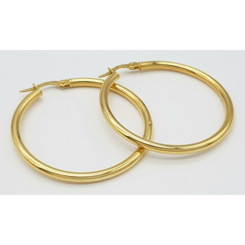 260 - A Pair of Italian 18K Yellow Gold Hoop Earrings. 3.5cm diameter. 2g weight.