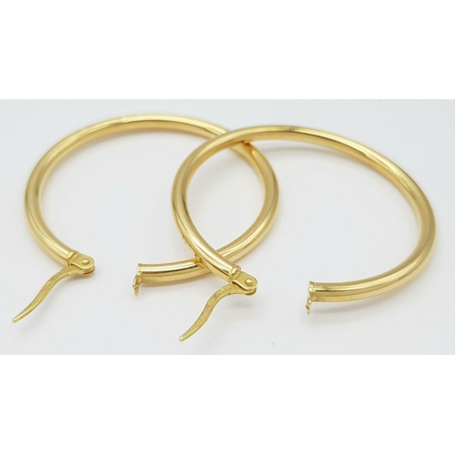 260 - A Pair of Italian 18K Yellow Gold Hoop Earrings. 3.5cm diameter. 2g weight.