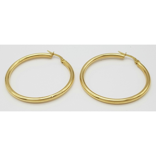 260 - A Pair of Italian 18K Yellow Gold Hoop Earrings. 3.5cm diameter. 2g weight.