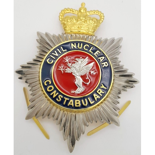 262 - A rare, metal, helmet badge of the CIVIL NUCLEAL CONSTABULARY in perfect condition. Dimensions: 115 ... 