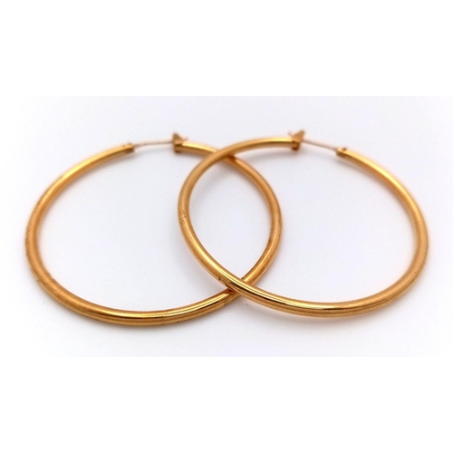 274 - A Pair of 18K Gold (tested) Hoop Earrings. 4cm diameter. 6.9g weight.