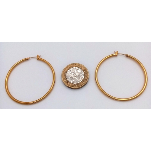 274 - A Pair of 18K Gold (tested) Hoop Earrings. 4cm diameter. 6.9g weight.