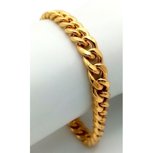 3 - An 18K Yellow Gold Curb Link Bracelet. In very good condition. 20cm length. 12.76g weight.