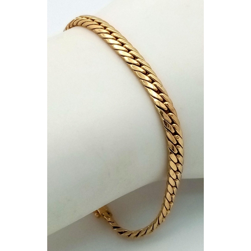 30 - An Italian 14K Yellow Gold Curb Link Bracelet. 15cm. 5.1g weight.