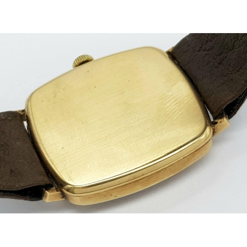 358 - A Vintage 9K Gold Rotary Gents Watch. Brown leather strap. 9K gold case - 28mm width. Gilded dial wi... 