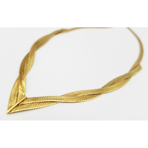 366 - A 9K Yellow Gold Herringbone Twist Necklace. 42cm. 6.1g weight.