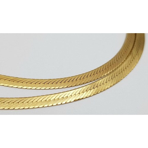 366 - A 9K Yellow Gold Herringbone Twist Necklace. 42cm. 6.1g weight.