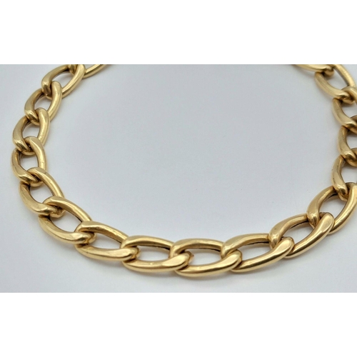 379 - An 18K Yellow Gold Elongated Curb Link Bracelet. 19cm. 11.75g weight.