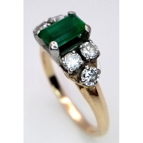 386 - An 18K Yellow Gold (tested), Emerald and Diamond Ring. 1ct central emerald with 0.6ctw of brilliant ... 